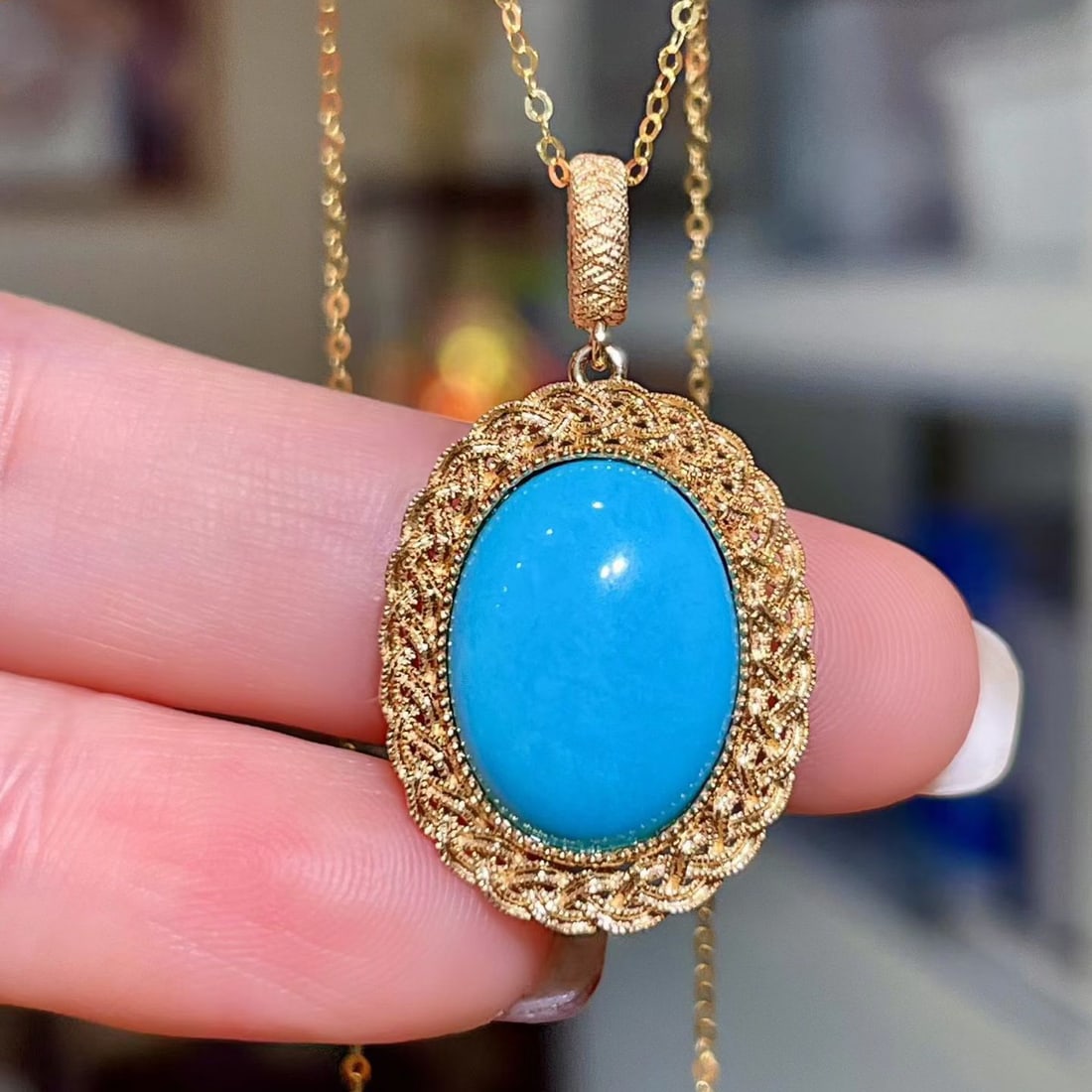14k Gold 5.51 Ct Natural Blue Turquoise Pendant( Without Chain ): Ref:231122121 // gold content:14k gold // main gemstone:blue turquoise // shape:oval // carat weight:5. 51ct // color:blue // treatment:natural // Condition: New Low Estimate: 4500.00 High Estimate: