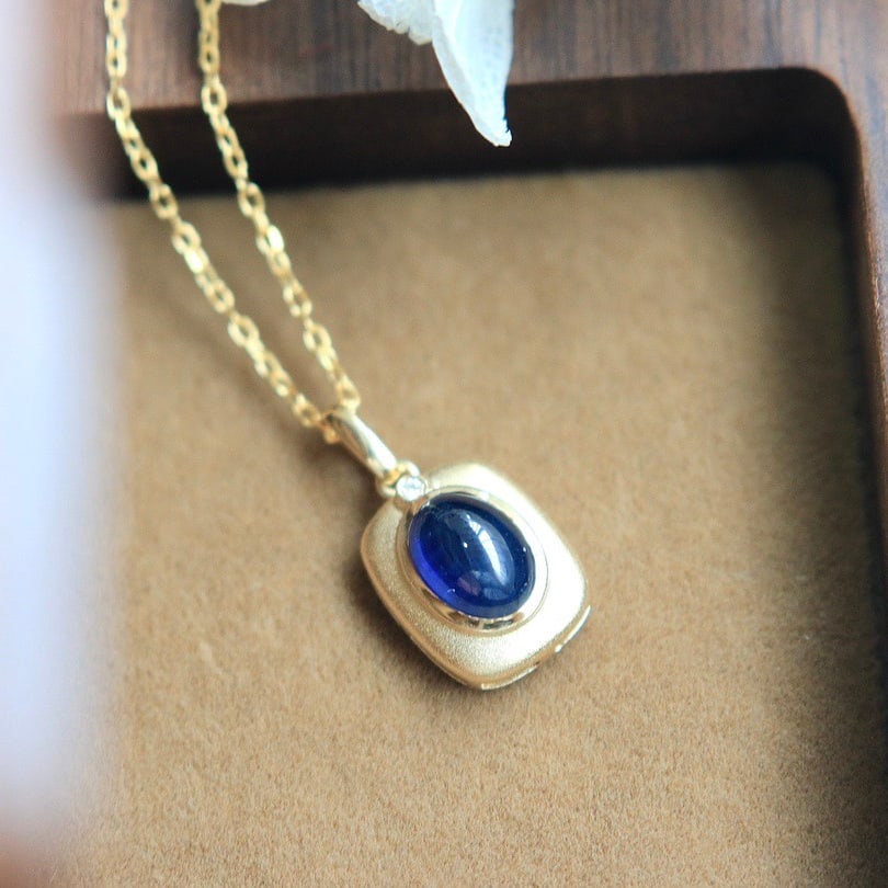 14k Gold 1.65 Ct Natural Sapphire & Diamond Pendant( Without Chain ): Ref:231122145 // gold content:14k gold // main gemstone:sapphire // shape:oval // carat weight:1. 65ct // color:blue // treatment:natural // // adjacent gemstone 2 : diamond // shape:round // clarity