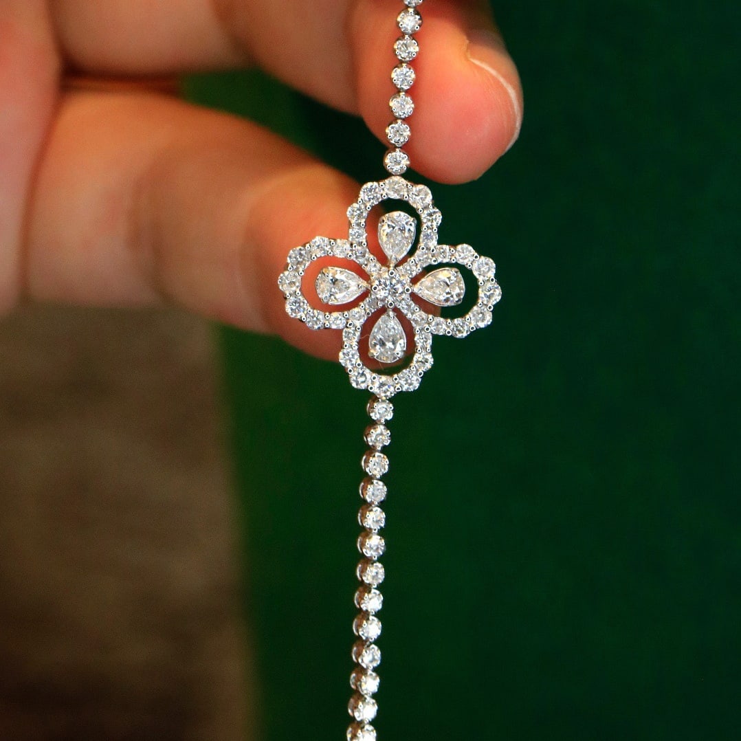 14k Gold 2.05 Ct Natural H Diamond Bracelet: Ref:231122166 // gold content:14k gold // main gemstone:diamond // shape:multiple // carat weight:2. 05ct // clarity grade:vs-si // color:h // treatment:natural // Condition: New Low Estimate: 8000.0