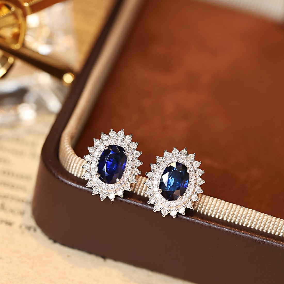 14k Gold 2.51 Ctw Natural Sapphire & Diamond Earrings: Ref:231122173 // gold content:14k gold // main gemstone:sapphire // shape:oval // carat weight:1. 91ct // color:blue // treatment:natural // // adjacent gemstone 2 : diamond // shape:round // carat we