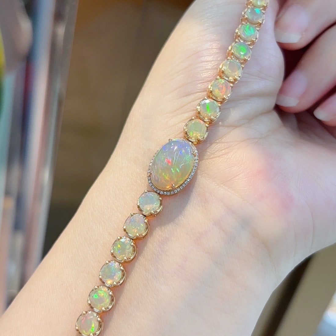 14k Gold 11.9 Ct Natural Opal & Diamond Bracelet: Ref:231122209 // gold content:14k gold // main gemstone:opal // shape:multiple // carat weight:11. 9ct // color:color // treatment:natural // // adjacent gemstone 2 : diamond // shape:round // clarity