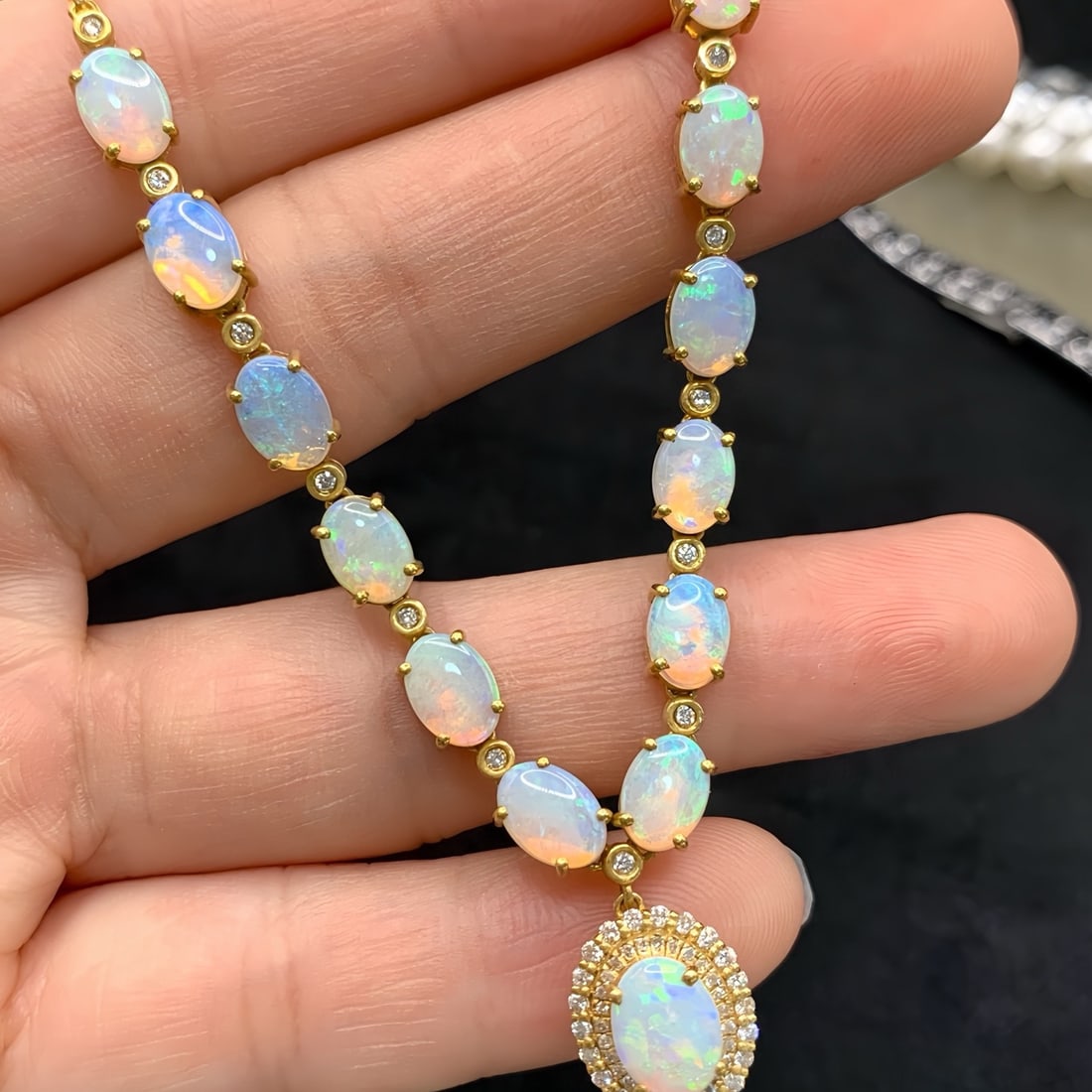 14k Gold 5.78 Ctw Natural Opal & Diamond Necklace: Ref:231122213 // gold content:14k gold // main gemstone:opal // shape:oval // carat weight:5. 35ct // color:color // treatment:natural // // adjacent gemstone 2 : diamond // number of stones:62 // sha