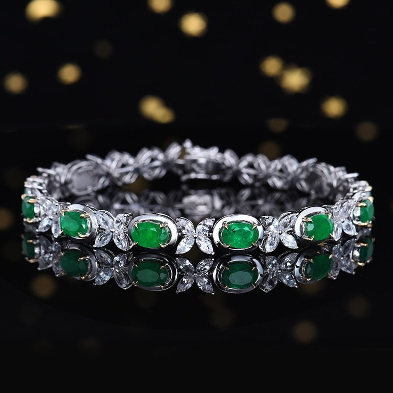 14k Gold 8.44 Ctw Vivid Green Natural Emerald & Sapphire Bracelet: Ref:231122242 // gold content:14k gold // main gemstone:emerald // shape:oval // carat weight:4. 6ct // color:vivid green // treatment:natural // // adjacent gemstone 2 : sapphire // number of