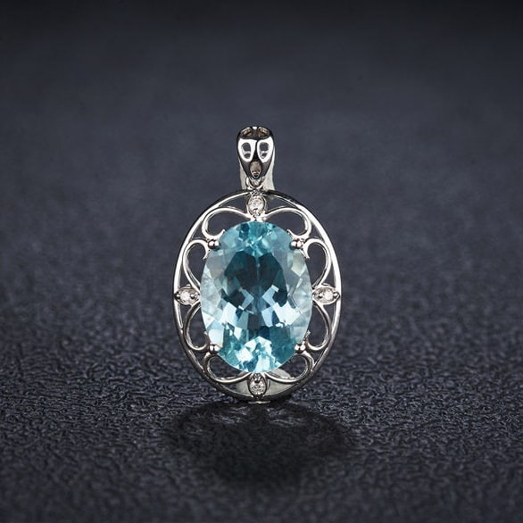 14k Gold 5.57 Ct Natural Aquamarine & Diamond Pendant( Without Chain ): Ref:231122276 // gold content:14k gold // main gemstone:aquamarine // shape:oval // carat weight:5. 57ct // color:santa maria color // treatment:natural // // adjacent gemstone 2 : diamond // shape:ro