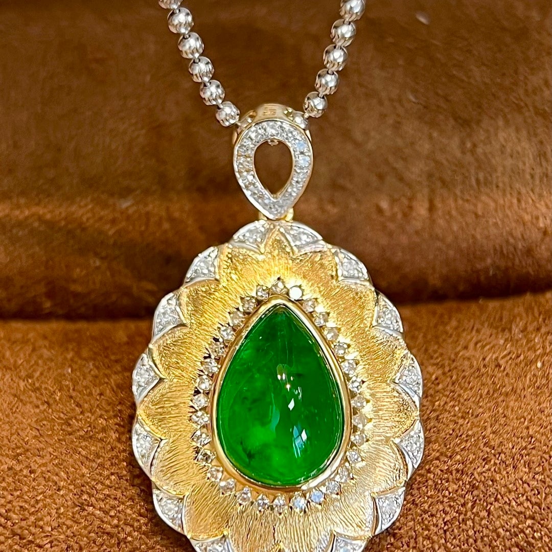 14k Gold 2.98 Ctw Vivid Green Natural Emerald & Diamond Pendant( Without Chain ): Ref:231122382 // gold content:14k gold // main gemstone:emerald // shape:pear // carat weight:2. 68ct // color:vivid green // treatment:natural // // adjacent gemstone 2 : diamond // shape:round // ca
