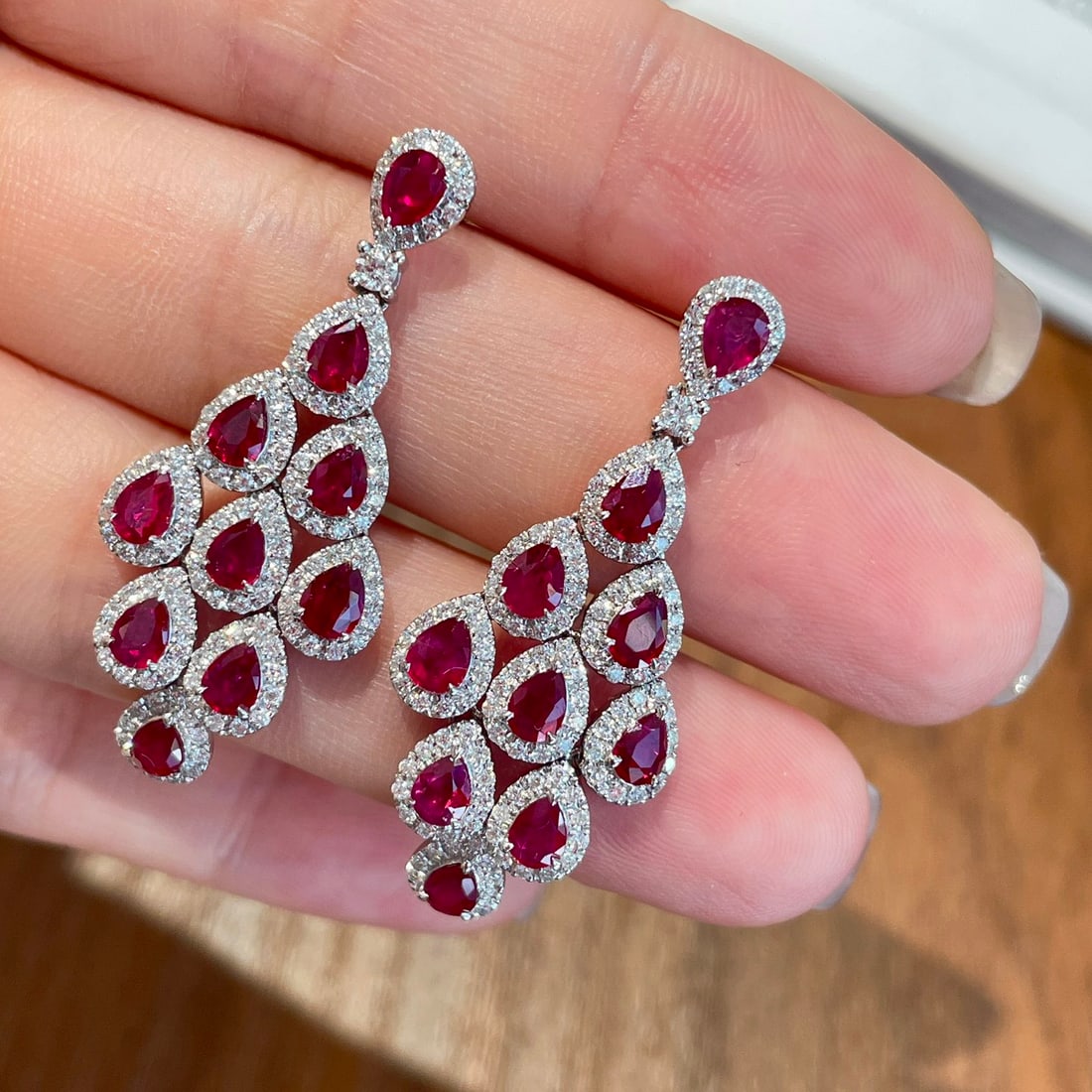 14k Gold 2.36 Ct Natural Ruby & Diamond Earrings: Ref:231122383 // gold content:14k gold // main gemstone:ruby // shape:pear // carat weight:2. 36ct // color:red // treatment:natural // // adjacent gemstone 2 : diamond // shape:round // clarity grade