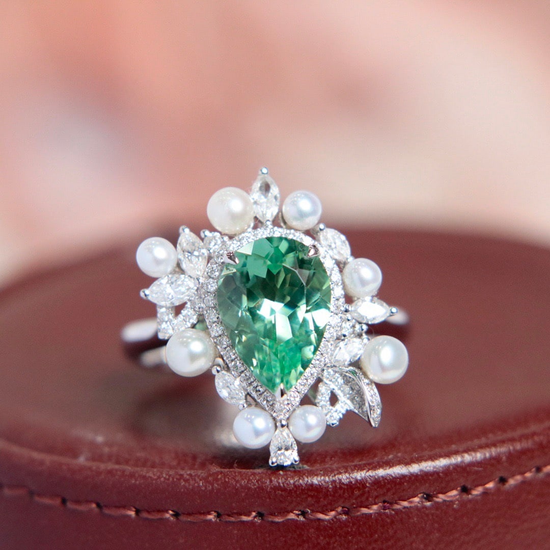 14k Gold 2.69 Ctw Natural Tourmaline & Diamond Ring/pendant( Without Chain ): Ref:231122438 // gold content:14k gold // ring size:7. 25us // // main gemstone:tourmaline // shape:pear // carat weight:2. 17ct // color:green // treatment:natural // // adjacent gemstone 2 : diamond