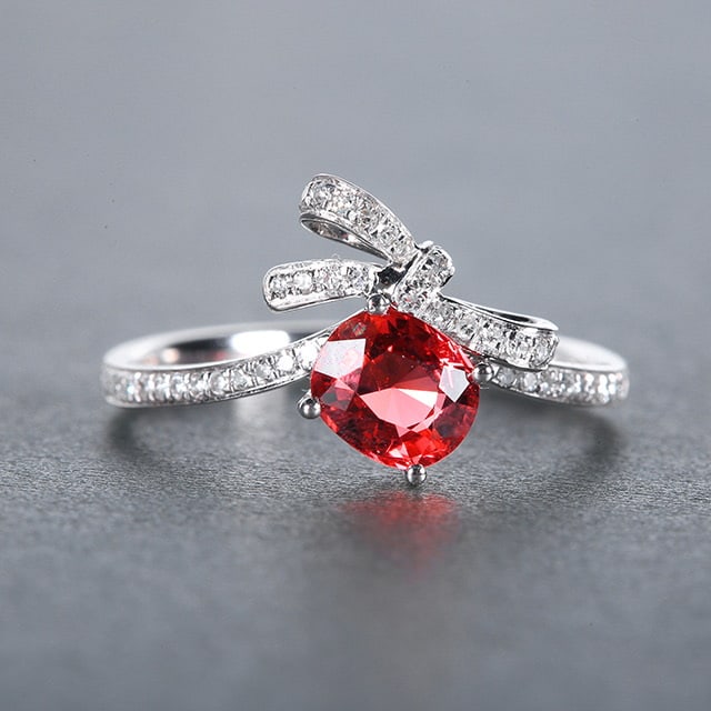 14k Gold 1.03 Ctw Natural Spinel & Diamond Ring: Ref:230978139 // gold content:14k gold // ring size:7. 25us // // main gemstone:spinel // shape:oval // carat weight:0. 9ct // color:orange // treatment:natural // // adjacent gemstone 2 : diamond //