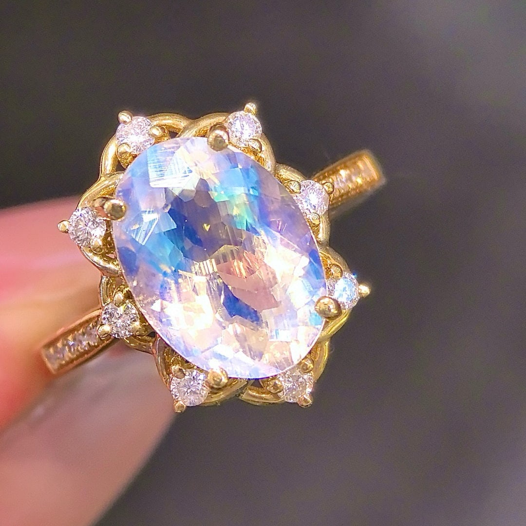 14k Gold 3.23 Ctw Natural Moonstone & Diamond Ring: Ref:230990037 // gold content:14k gold // ring size:7. 25us // // main gemstone:moonstone // shape:oval // carat weight:3. 0ct // color:white // treatment:natural // // adjacent gemstone 2 : diamond /