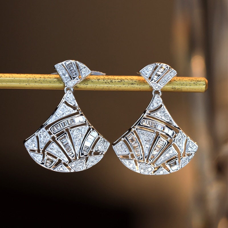 14k Gold 0.8 Ct Natural H Diamond Earrings: Ref:231142081 // gold content:14k gold // main gemstone:diamond // shape:multiple // carat weight:0. 8ct // clarity grade:vs-si // color:h // treatment:natural // Condition: NewLow Estimate: