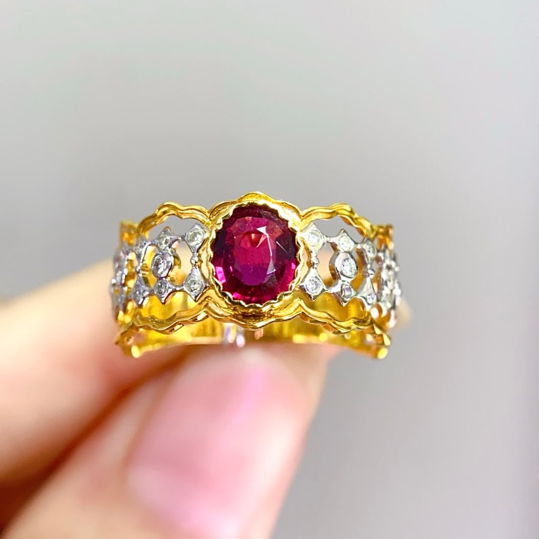 14k Gold 0.73 Ctw Natural Tourmaline & Diamond Ring: Ref:231142186 // gold content:14k gold // ring size:7. 25us // // main gemstone:tourmaline // shape:oval // carat weight:0. 55ct // color:red // treatment:natural // // adjacent gemstone 2 :