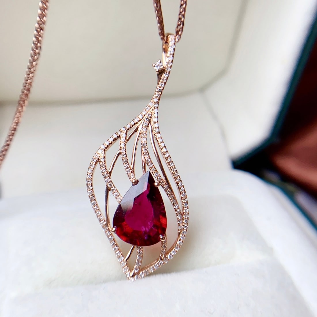 14k Gold 2.40 Ct Natural Tourmaline & Diamond Pendant( Without Chain ): Ref:231142295 // gold content:14k gold // main gemstone:tourmaline // shape:pear // carat weight:2. 40ct // color:red // treatment:natural // // adjacent gemstone 2 : diamond // number of stones:142 /