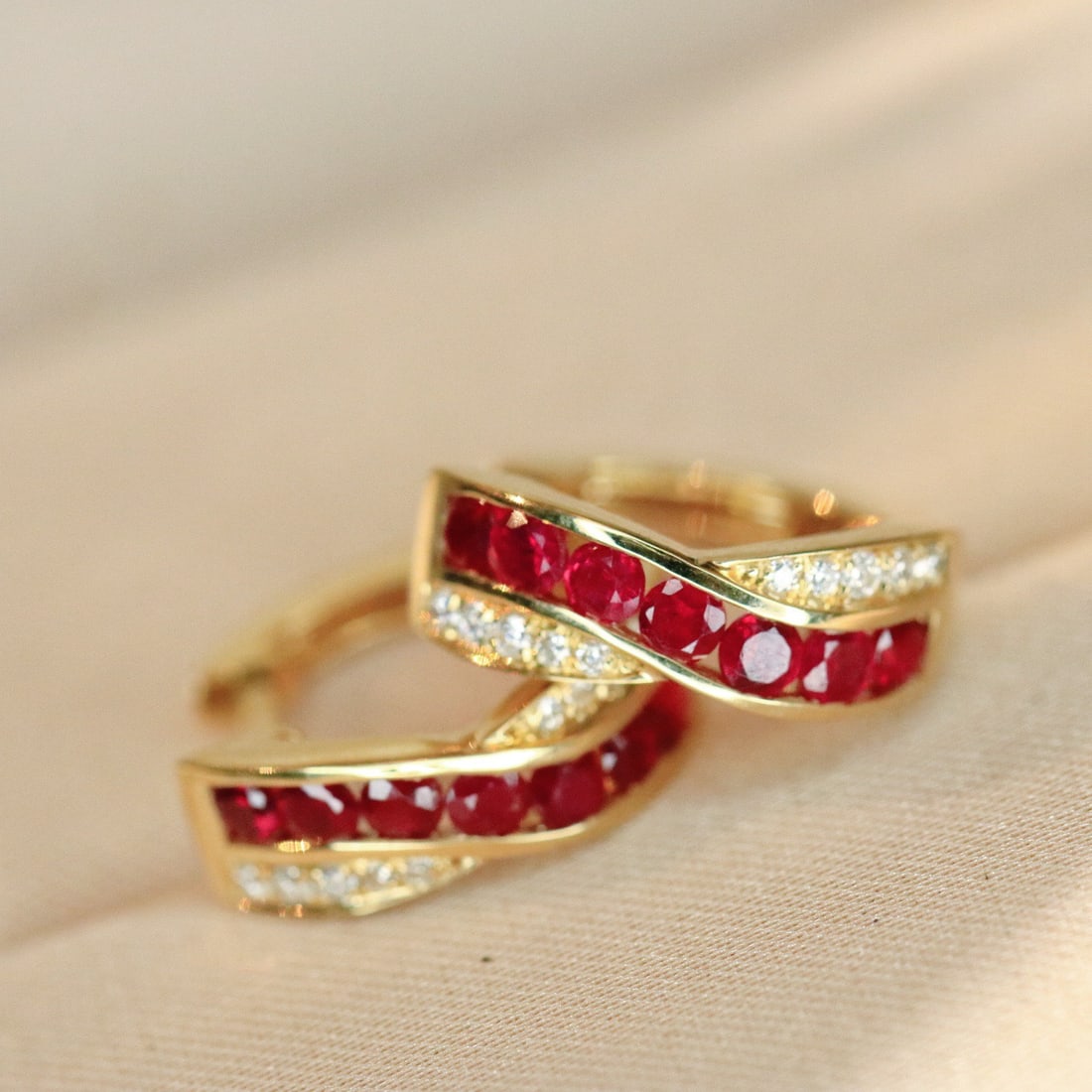 14k Gold 0.76 Ctw Natural Ruby & Diamond Earrings: Ref:231142381 // gold content:14k gold // main gemstone:ruby // shape:round // carat weight:0. 66ct // color:red // treatment:natural // cut grade:g // // adjacent gemstone 2 : diamond // shape:round