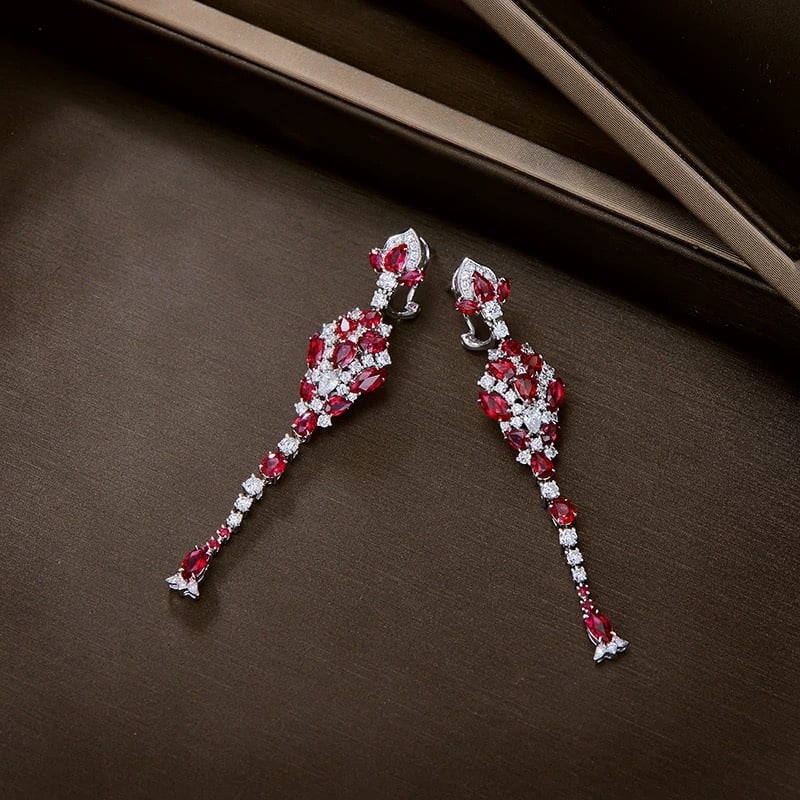 14k Gold 7.28 Ctw Natural Ruby & Diamond Earrings: Ref:230967049 // gold content:14k gold // main gemstone:ruby // shape:multiply // carat weight:5. 59ct // color:pigeonblood red // treatment:natural // // adjacent gemstone 2 : diamond // shape:round 