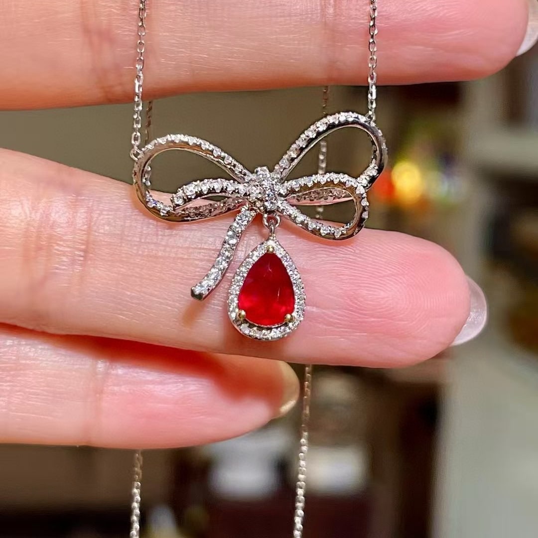 14k Gold 1.65 Ctw Natural Ruby & Diamond Necklace: Ref:230968156 // gold content:14k gold // main gemstone:ruby // shape:pear // carat weight:1. 00ct // color:pigeonblood red // treatment:natural // // adjacent gemstone 2 : diamond // shape:round // c