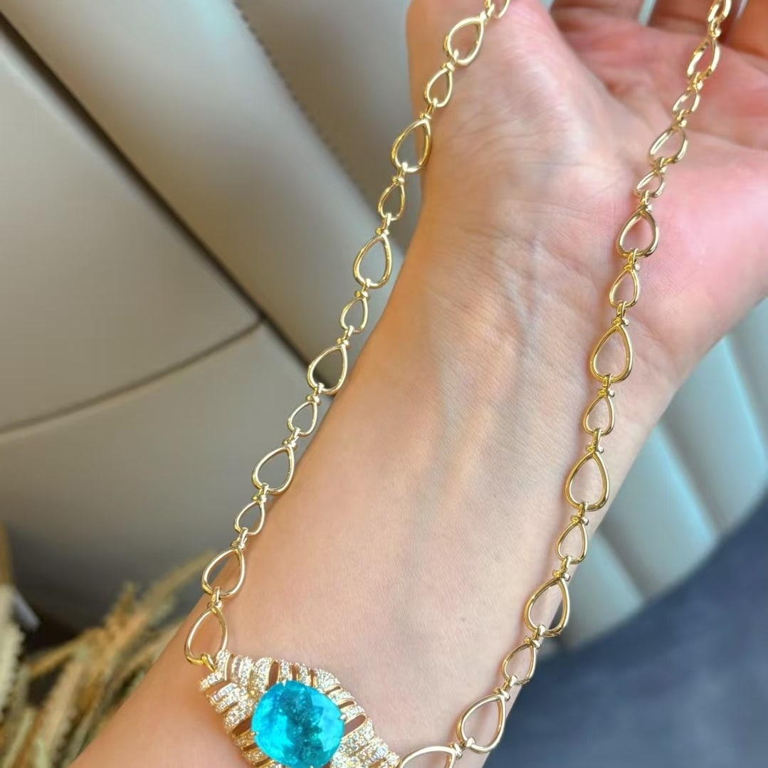 14k Gold 7.3 Ct Natural Paraiba Tourmaline & Diamond Necklace: Ref:230968224 // gold content:14k gold // main gemstone:paraiba tourmaline // shape:cushion // carat weight:7. 3ct // color:blue // treatment:natural // // adjacent gemstone 2 : diamond //