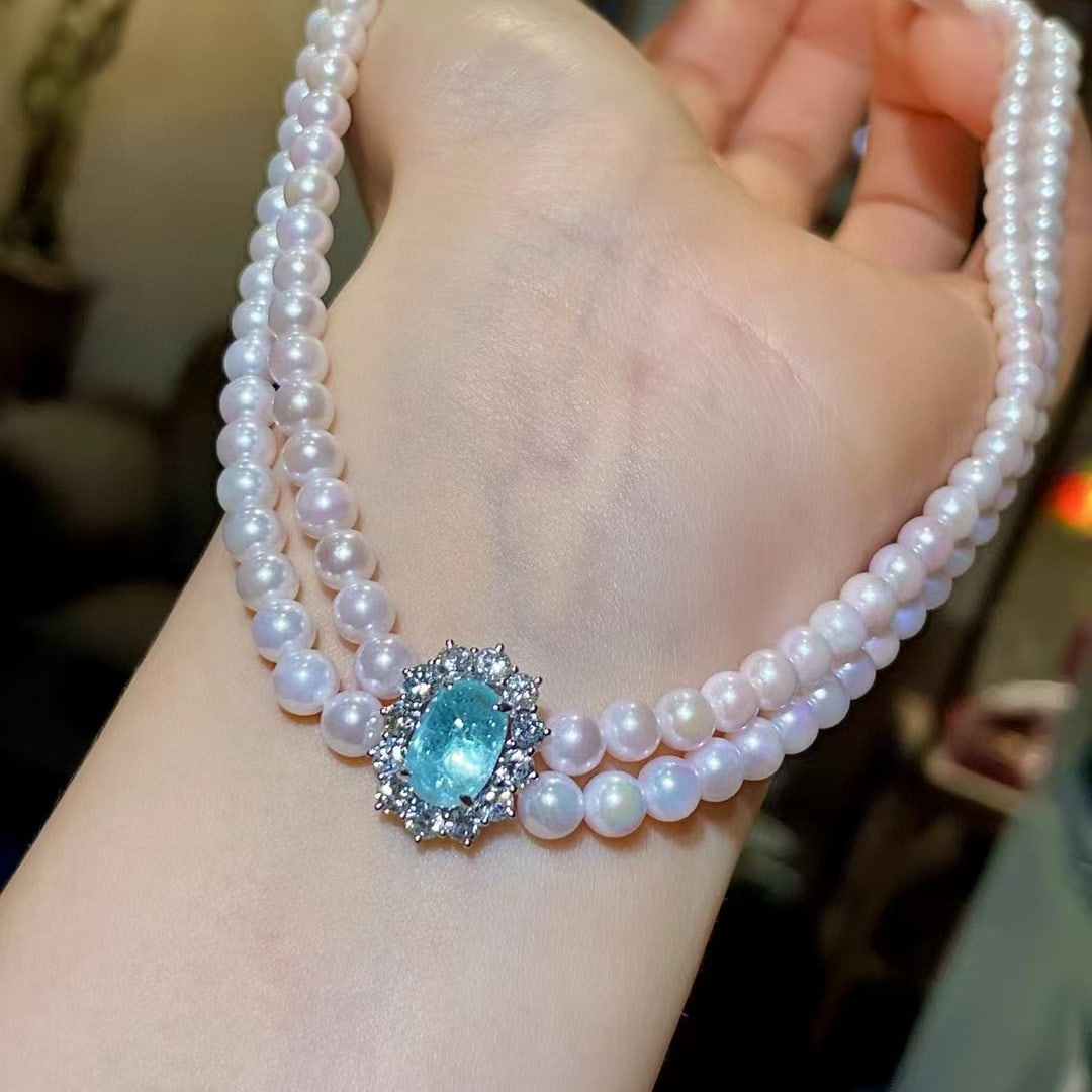 14k Gold 4.46 Ctw Natural Paraiba Tourmaline & Diamond Necklace: Ref:230968283 // gold content:14k gold // main gemstone:paraiba tourmaline // shape:oval // carat weight:3. 25ct // color:blue // treatment:natural // // adjacent gemstone 2 : diamond // shape:round