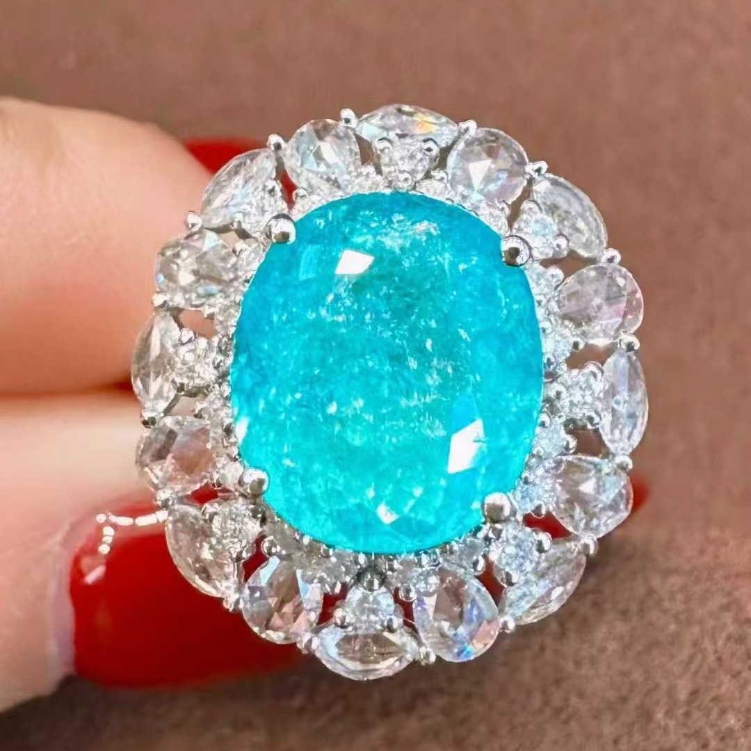 14k Gold 5.53 Ctw Natural Paraiba Tourmaline & Diamond Ring/pendant( Without Chain ): Ref:231137018 // gold content:14k gold // ring size:7. 25us // // main gemstone:paraiba tourmaline // shape:oval // carat weight:4. 51ct // color:blue // treatment:natural // // adjacent gemstone 2 :