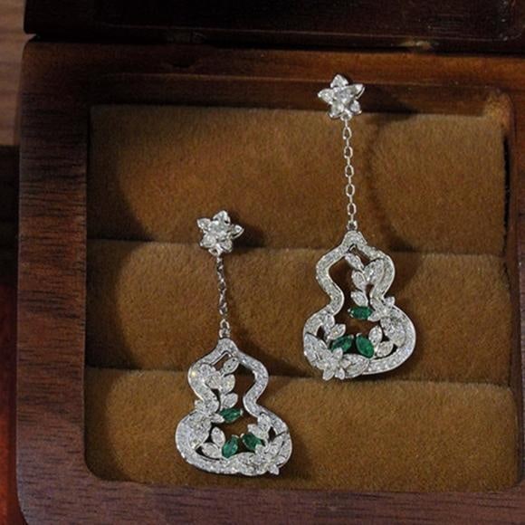 14k Gold 0.50 Ct Natural H Diamond Earrings: Ref:231137030 // gold content:14k gold // main gemstone:diamond // shape:round // carat weight:0. 50ct // clarity grade:vs-si // color:h // treatment:natural // cut grade:g // Condition: NewLow