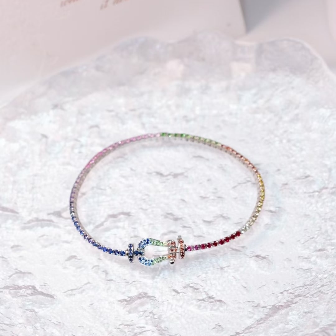 14k Gold 3.00 Ct Natural Coloured Gemstone Bracelet: Ref:231137078 // gold content:14k gold // main gemstone:coloured gemstone // shape:round // carat weight:3. 00ct // color:color // treatment:natural // cut grade:g // Condition: NewLow Estimate: