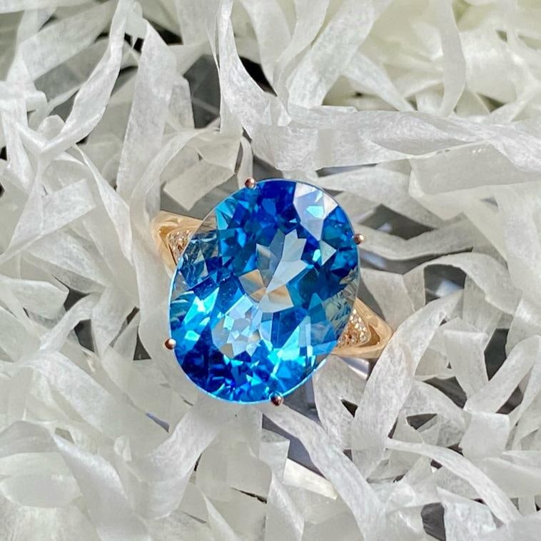 14k Gold 9.25 Ct Natural Topaz & Diamond Ring: Ref:231137081 // gold content:14k gold // ring size:7. 25us // // main gemstone:topaz // shape:oval // carat weight:9. 25ct // color:blue // treatment:natural // // adjacent gemstone 2 : diamond