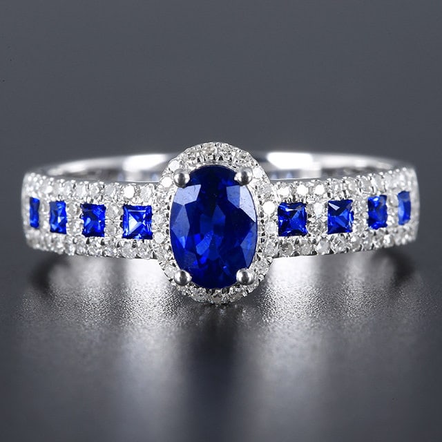 14k Gold 0.89 Ctw Natural Sapphire & Diamond Ring: Ref:231137093 // gold content:14k gold // ring size:7. 25us // // main gemstone:sapphire // shape:oval // carat weight:0. 65ct // color:blue // treatment:natural // // adjacent gemstone 2 :