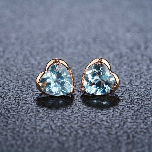 14k Gold 2.12 Ct Natural Aquamarine Earrings: Ref:231137104 // gold content:14k gold // main gemstone:aquamarine // shape:heart // carat weight:2. 12ct // color:blue // treatment:natural // Condition: NewLow Estimate: 1300.00High Estimate: