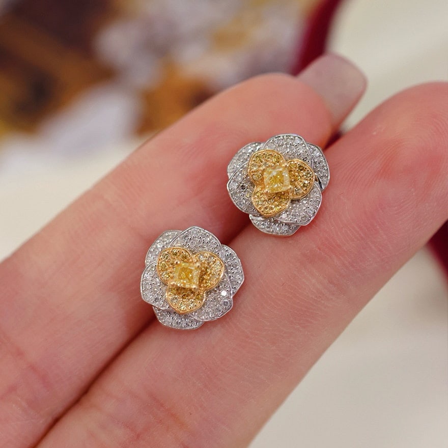 14k Gold 0.65 Ct Natural Color Diamond Earrings: Ref:231137171 // gold content:14k gold // main gemstone:diamond // shape:multiple // carat weight:0. 65ct // clarity grade:vs-si // color:color // treatment:natural // Condition: NewLow Estimate: