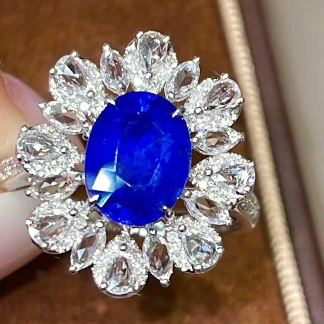 14k Gold 2.63 Ctw Natural Sapphire & Diamond Ring: Ref:231137215 // gold content:14k gold // ring size:7. 25us // // main gemstone:sapphire // shape:oval // carat weight:2. 33ct // color:blue // treatment:natural // // adjacent gemstone 2 :