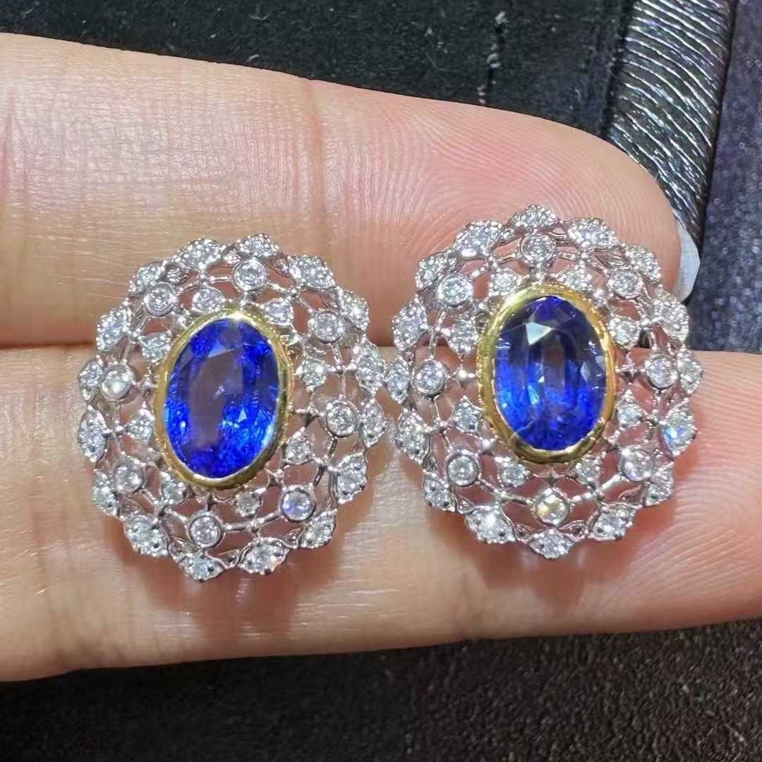 14k Gold 2.30 Ctw Natural Sapphire & Diamond Earrings: Ref:231137253 // gold content:14k gold // main gemstone:sapphire // shape:oval // carat weight:1. 95ct // color:blue // treatment:natural // // adjacent gemstone 2 : diamond // shape:round // carat