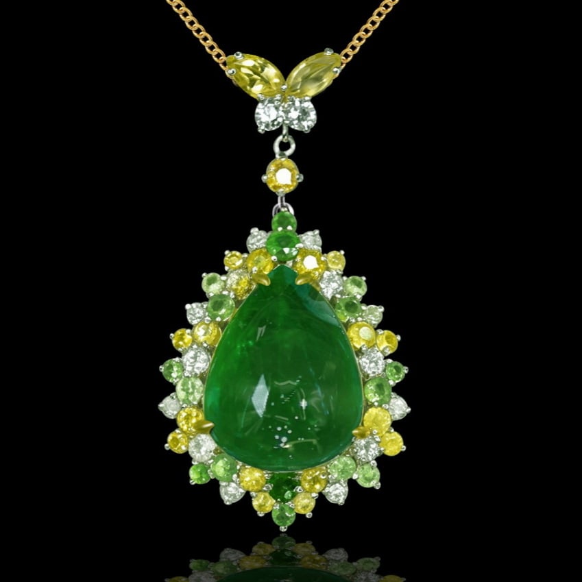 14k Gold 9.87 Ctw Natural Emerald & Sapphire Pendant( Without Chain ): Ref:231138048 // gold content:14k gold // main gemstone:emerald // shape:pear // carat weight:8. 58ct // color:green // treatment:natural // // adjacent gemstone 2 : sapphire // shape:multiple //