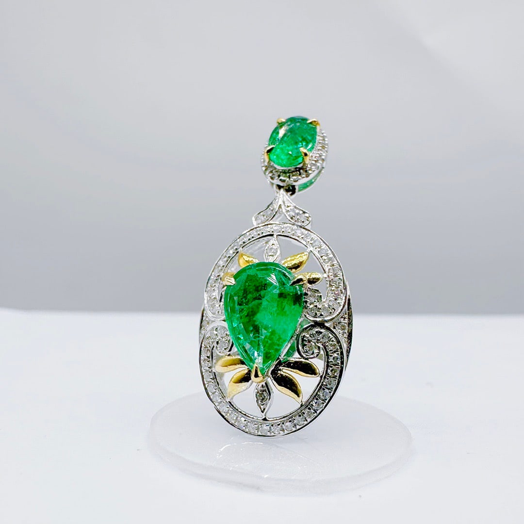 14k Gold 1.34 Ctw Natural Emerald & Diamond Pendant( Without Chain ): Ref:231138063 // gold content:14k gold // main gemstone:emerald // shape:pear // carat weight:1. 10ct // color:green // treatment:natural // // adjacent gemstone 2 : diamond // shape:round // carat