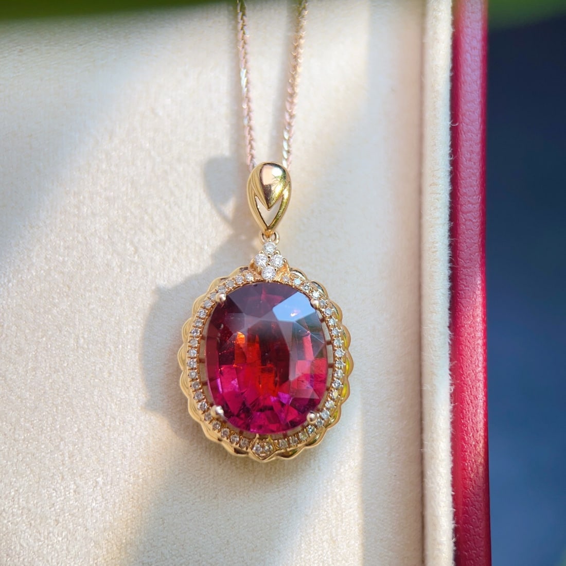 14k Gold 6.02 Ctw Natural Tourmaline & Diamond Pendant( Without Chain ): Ref:231138098 // gold content:14k gold // main gemstone:tourmaline // shape:oval // carat weight:5. 85ct // color:red // treatment:natural // // adjacent gemstone 2 : diamond // number of stones:48
