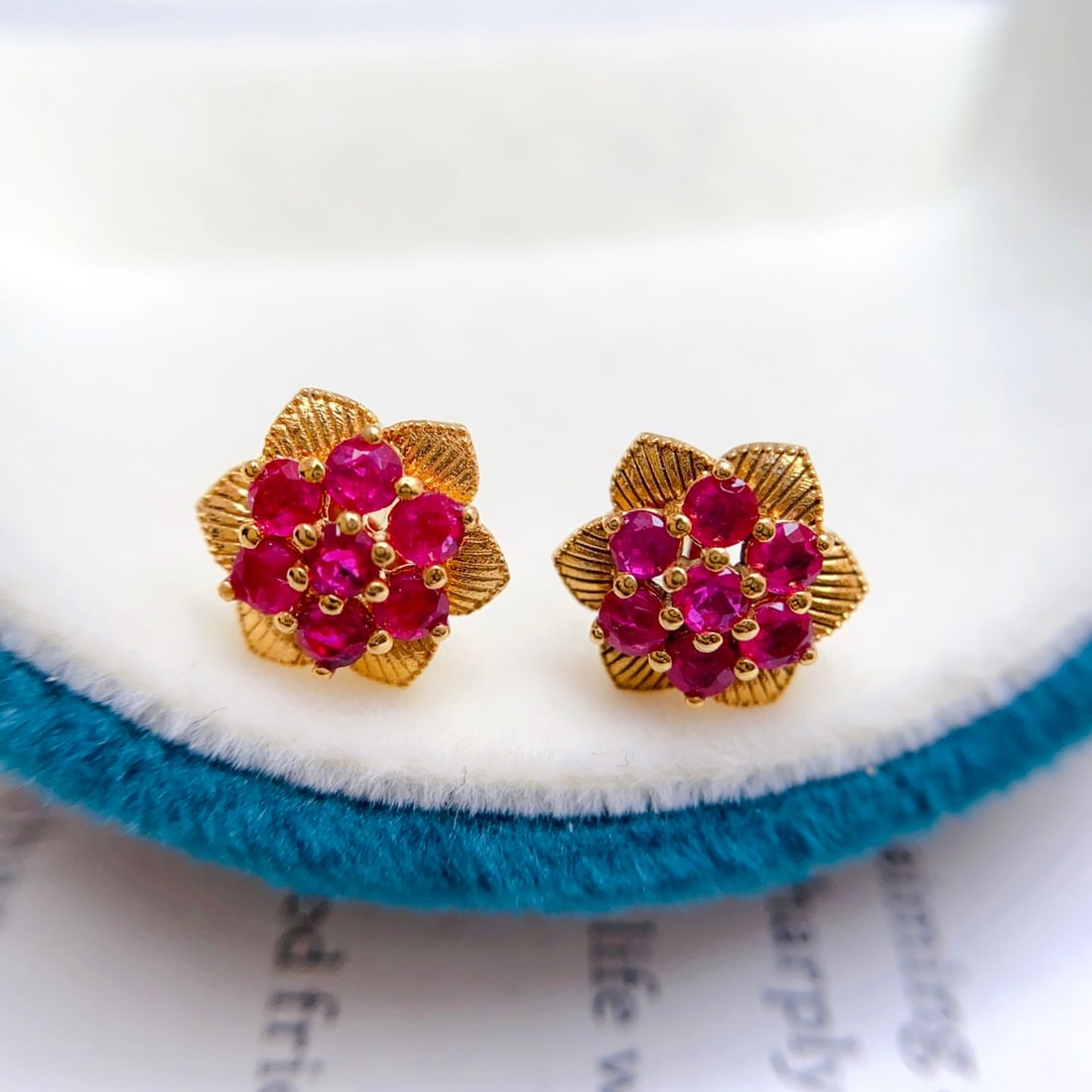 14k Gold 1.50 Ct Natural Ruby Earrings: Ref:231138112 // gold content:14k gold // main gemstone:ruby // shape:round // carat weight:1. 50ct // color:red // treatment:natural // cut grade:g // Condition: NewLow Estimate: 2600.00High