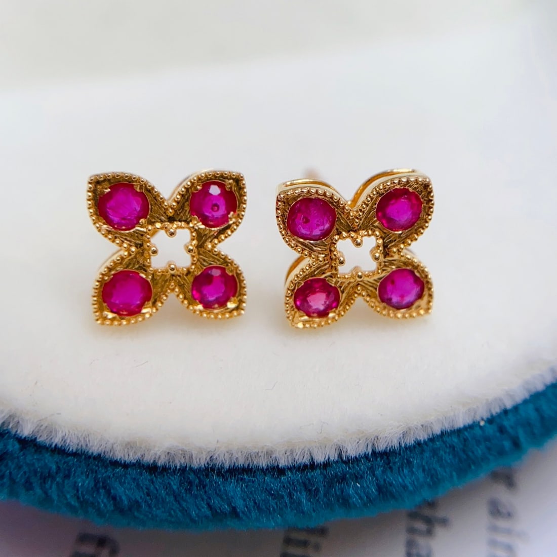 14k Gold 0.80 Ct Natural Ruby Earrings: Ref:231138200 // gold content:14k gold // main gemstone:ruby // shape:round // carat weight:0. 80ct // color:red // treatment:natural // cut grade:g // Condition: New Low Estimate: 2100.00 High Estim