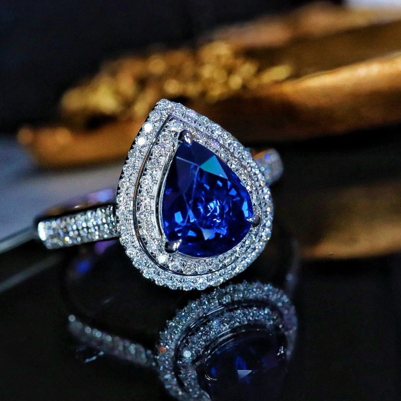14k Gold 1.48 Ctw Natural Sapphire & Diamond Ring: Ref:231138369 // gold content:14k gold // ring size:7. 25us // // main gemstone:sapphire // shape:pear // carat weight:1. 2ct // color:blue // treatment:natural // // adjacent gemstone 2 : diamond