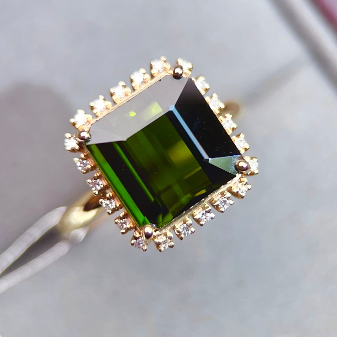 14k Gold 5.96 Ctw Natural Tourmaline & Diamond Ring: Ref:231138396 // gold content:14k gold // ring size:7. 25us // // main gemstone:tourmaline // shape:octagonal // carat weight:5. 85ct // color:green // treatment:natural // // adjacent gemstone 2