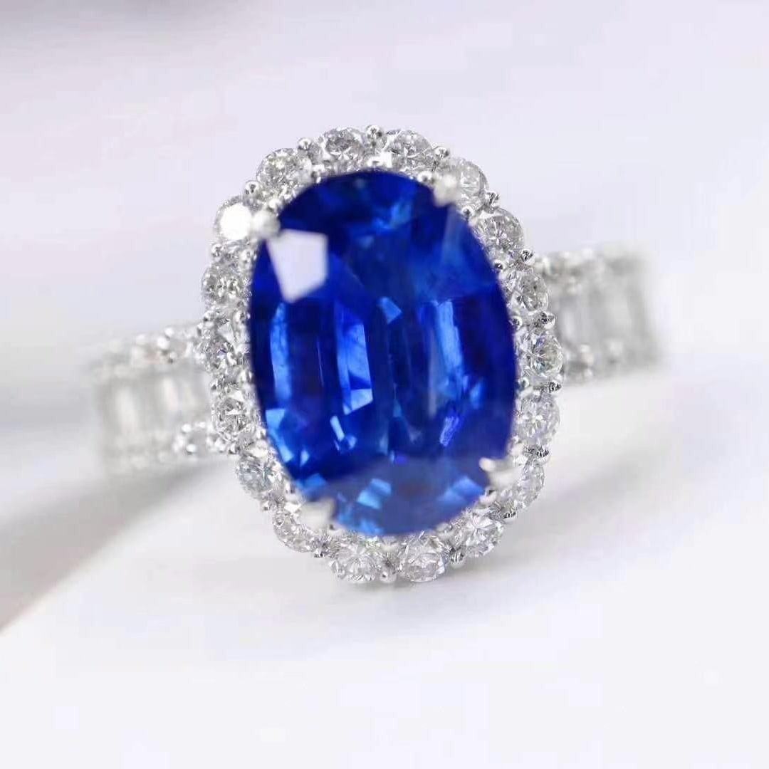 14k Gold 3.41 Ctw Natural Sapphire & Diamond Ring: Ref:230949061 // gold content:14k gold // ring size:7. 25us // // main gemstone:sapphire // shape:oval // carat weight:2. 8ct // color:royal blue // treatment:natural // // adjacent gemstone 2 : diamo
