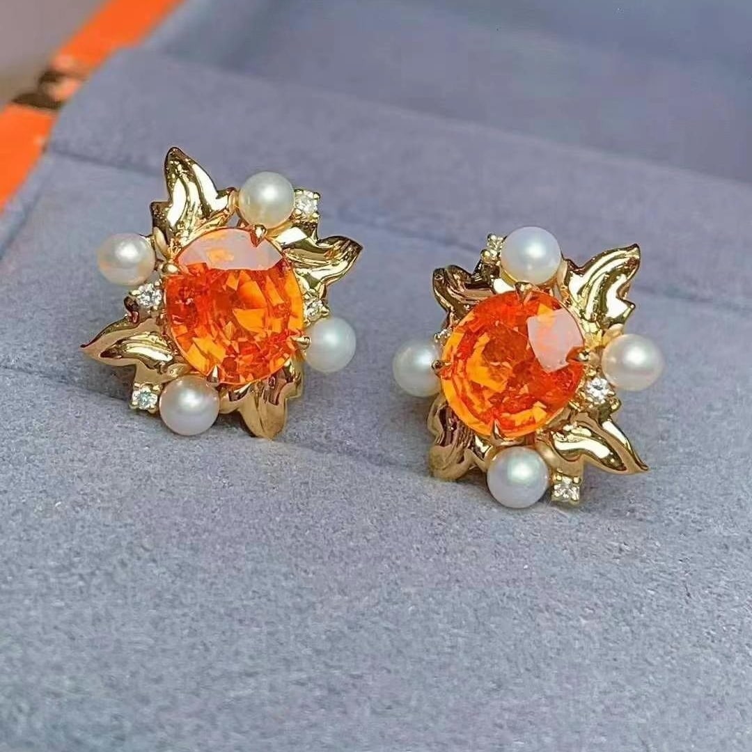 14k Gold 4.88 Ct Natural Spessartine & Diamond Earrings: Ref:230949207 // gold content:14k gold // main gemstone:spessartine // shape:oval // carat weight:4. 88ct // color:orange // treatment:natural // // adjacent gemstone 2 : diamond // shape:round //