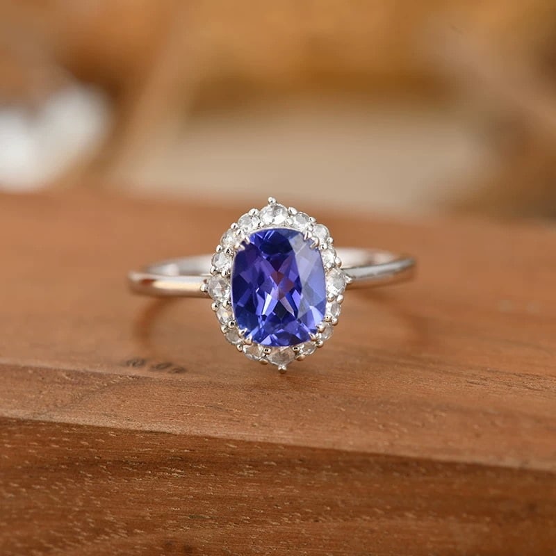 14k Gold 1.29 Ct Natural Tanzanite & Diamond Ring: Ref:230950009 // gold content:14k gold // ring size:7. 25us // // main gemstone:tanzanite // shape:cushion // carat weight:1. 29ct // color:blue // treatment:natural // // adjacent gemstone 2 : diamon
