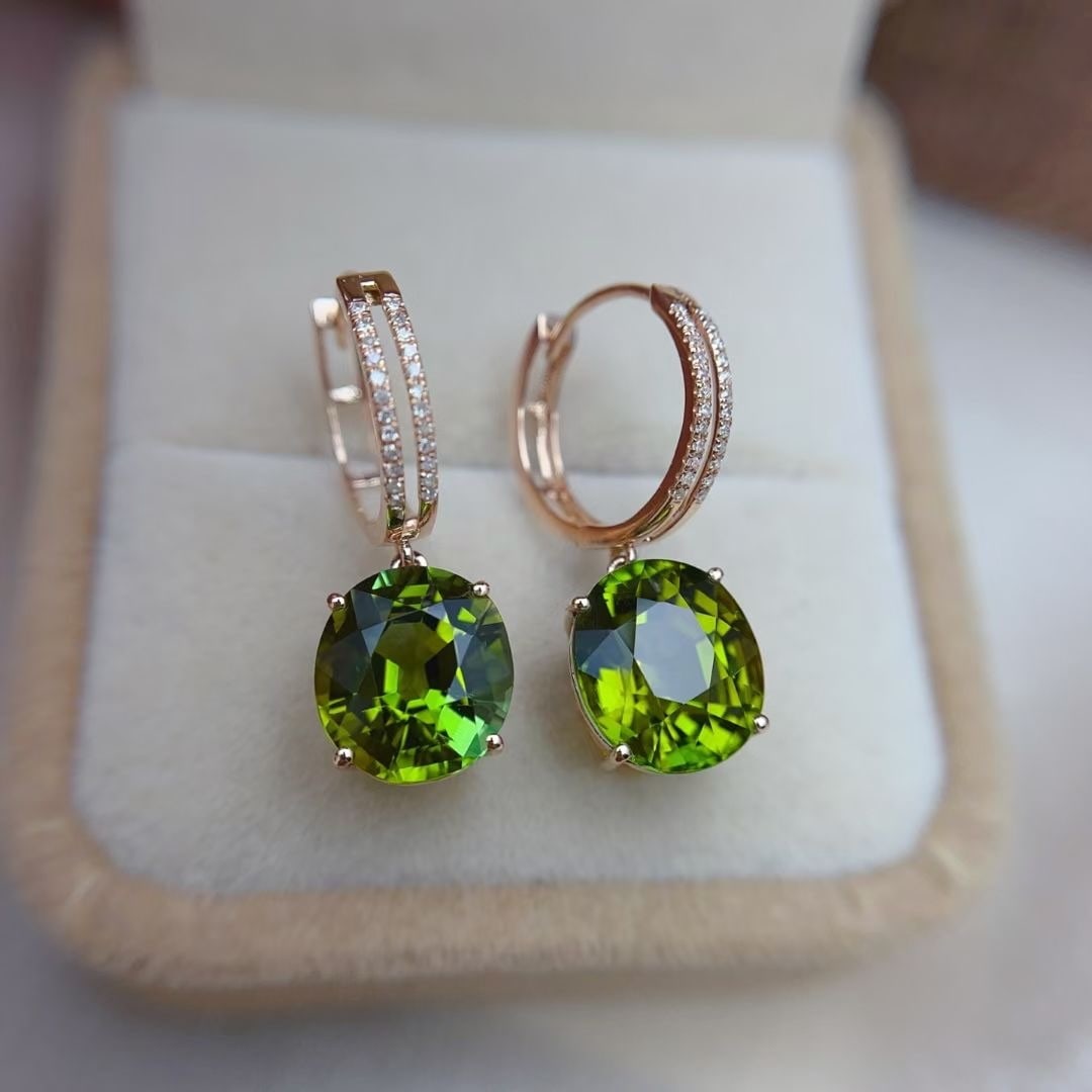 14k Gold 8.25 Ct Natural Tourmaline & Diamond Earrings: Ref:230950095 // gold content:14k gold // main gemstone:tourmaline // shape:oval // carat weight:8. 25ct // color:green // treatment:natural // // adjacent gemstone 2 : diamond // number of stones:48