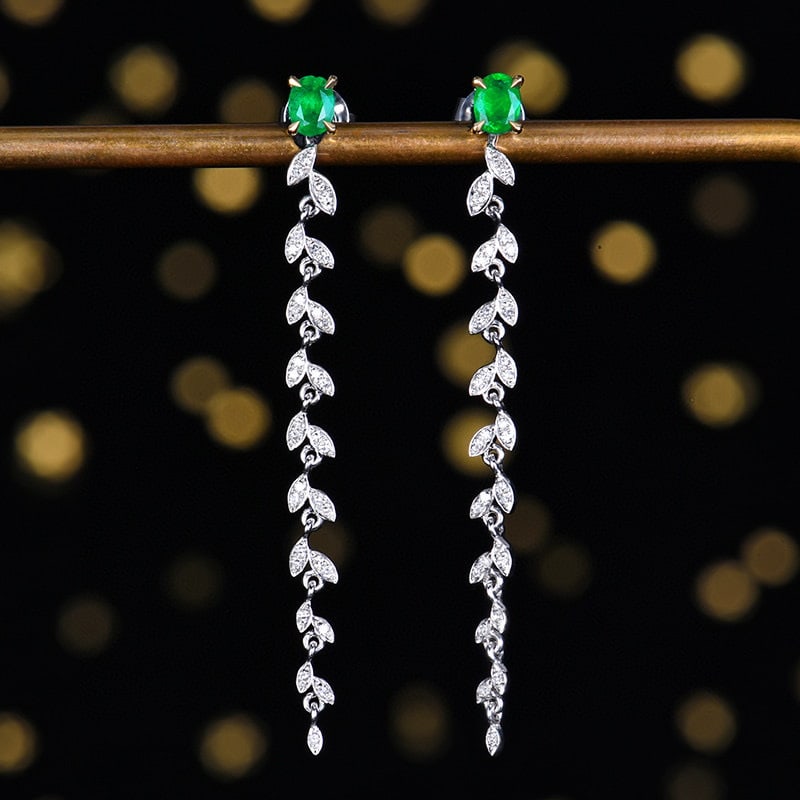 14k Gold 0.49 Ctw Vivid Green Natural Emerald & Diamond Earrings: Ref:230950198 // gold content:14k gold // main gemstone:emerald // shape:oval // carat weight:0. 33ct // color:vivid green // treatment:natural // // adjacent gemstone 2 : diamond // number of