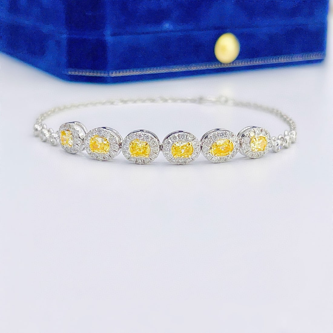 14k Gold 1.37 Ctw Natural Yellow Diamond & Diamond Bracelet: Ref:230950286 // gold content:14k gold // main gemstone:yellow diamond // shape:oval // carat weight:0. 81ct // color:yellow // treatment:natural // // adjacent gemstone 2 : diamond // shape:round