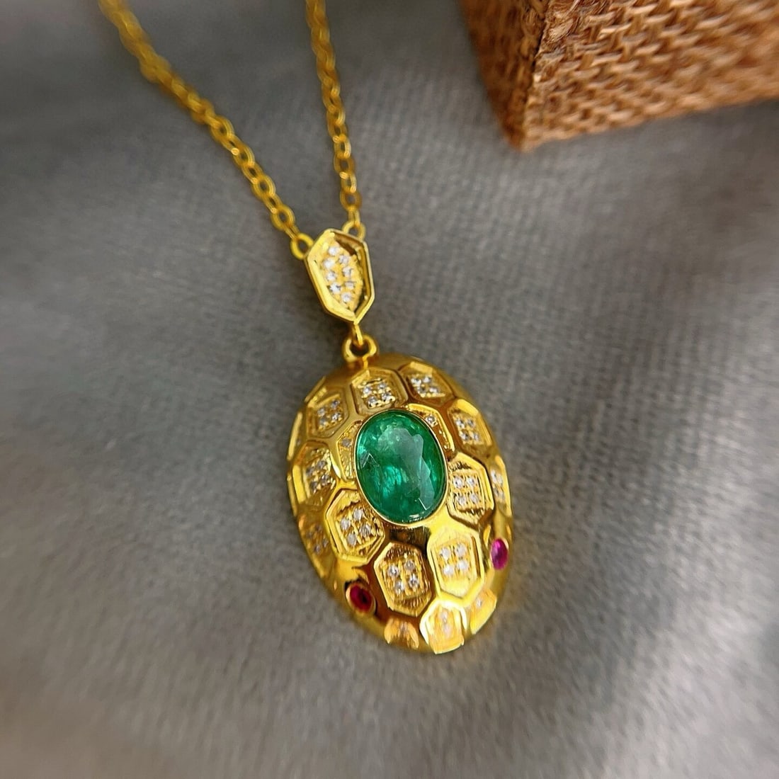 14k Gold 1.00 Ct Natural Emerald & Diamond & Ruby Pendant( Without Chain ): Ref:230950349 // gold content:14k gold // main gemstone:emerald // shape:oval // carat weight:1. 00ct // color:green // treatment:natural // // adjacent gemstone 2 : diamond // number of stones:62 //