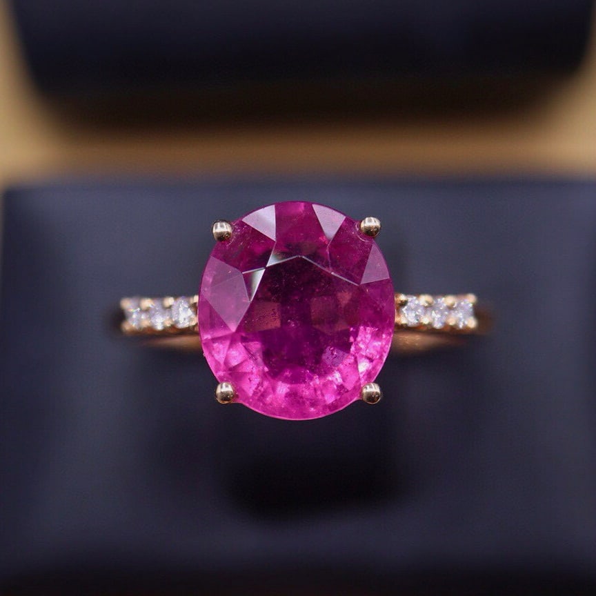 14k Gold 3.14 Ct Natural Tourmaline & Diamond Ring: Ref:230950410 // gold content:14k gold // ring size:7. 25us // // main gemstone:tourmaline // shape:oval // carat weight:3. 14ct // color:red // treatment:natural // // adjacent gemstone 2 :
