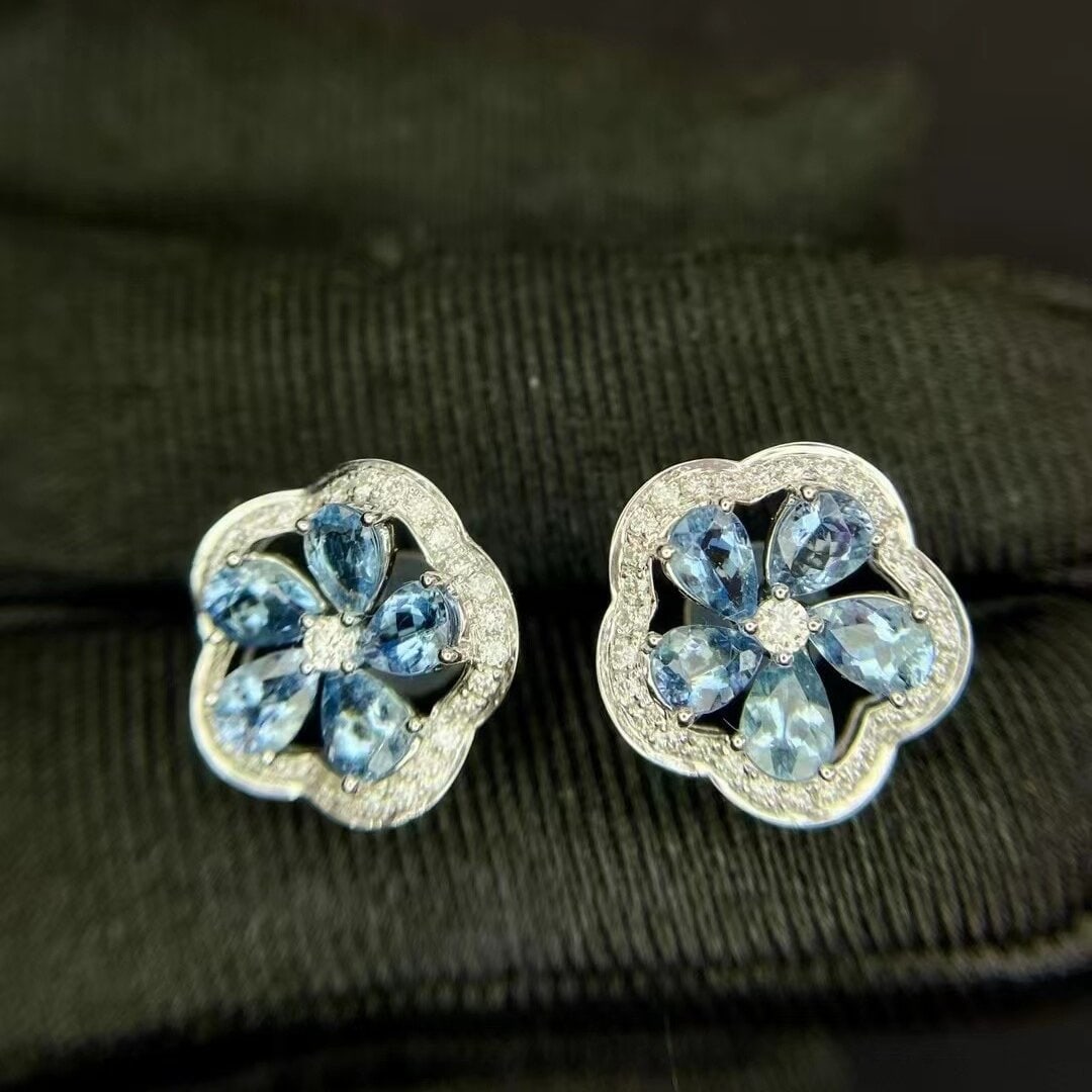 14k Gold 1.73 Ctw Natural Aquamarine & Diamond Earrings: Ref:230950436 // gold content:14k gold // main gemstone:aquamarine // shape:pear // carat weight:1. 38ct // color:santa maria color // treatment:natural // // adjacent gemstone 2 : diamond //