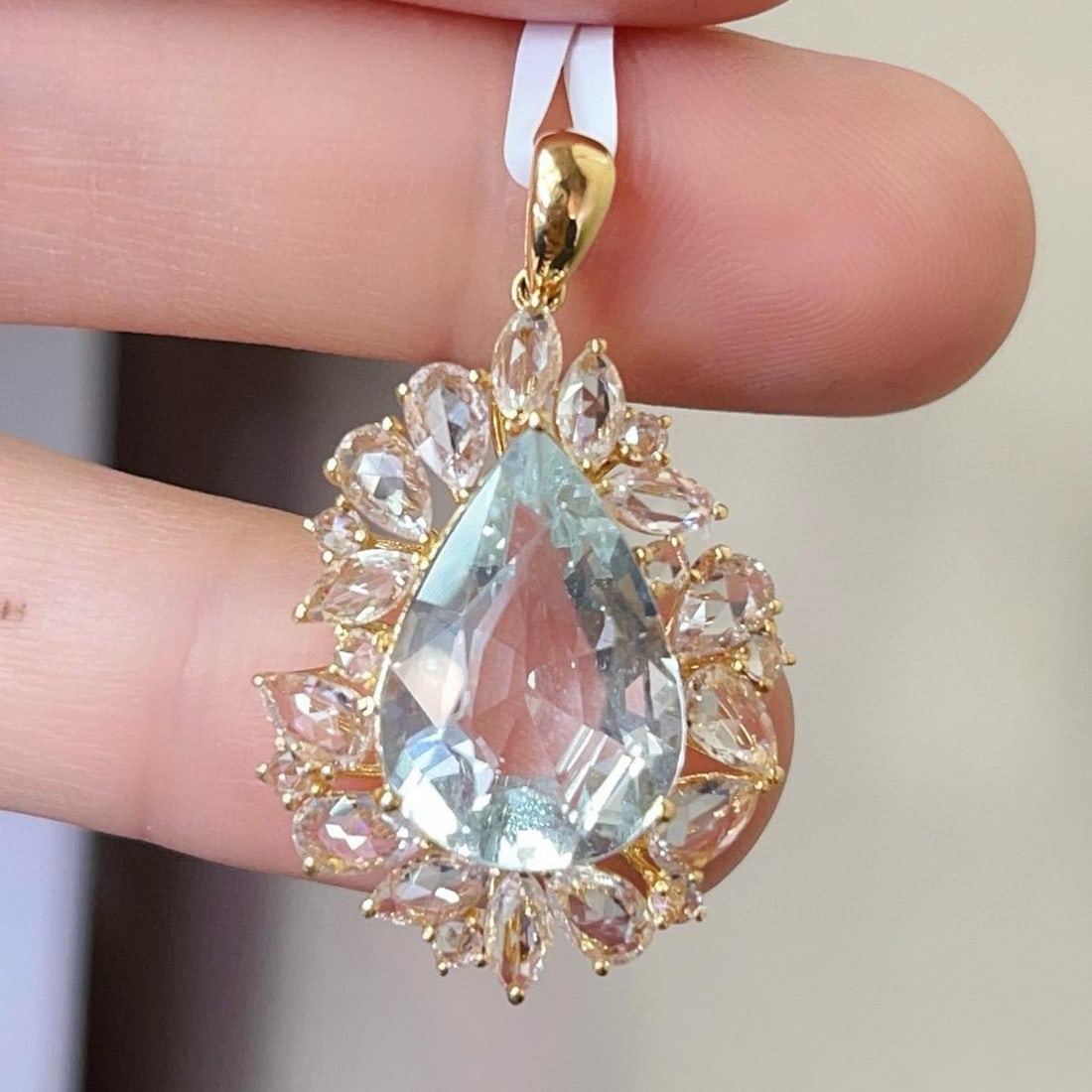14k Gold 5.20 Ct Natural Aquamarine & Sapphire Pendant( Without Chain ): Ref:231145205 // gold content:14k gold // main gemstone:aquamarine // shape:pear // carat weight:5. 20ct // color:blue // treatment:natural // // adjacent gemstone 2 : sapphire // number of