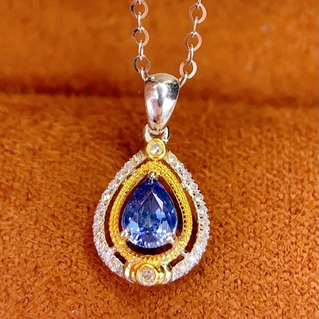 14k Gold 0.5 Ct Natural Sapphire & Diamond Pendant( Without Chain ): Ref:231145222 // gold content:14k gold // main gemstone:sapphire // shape:pear // carat weight:0. 5ct // color:blue // treatment:natural // // adjacent gemstone 2 : diamond // number of stones:26