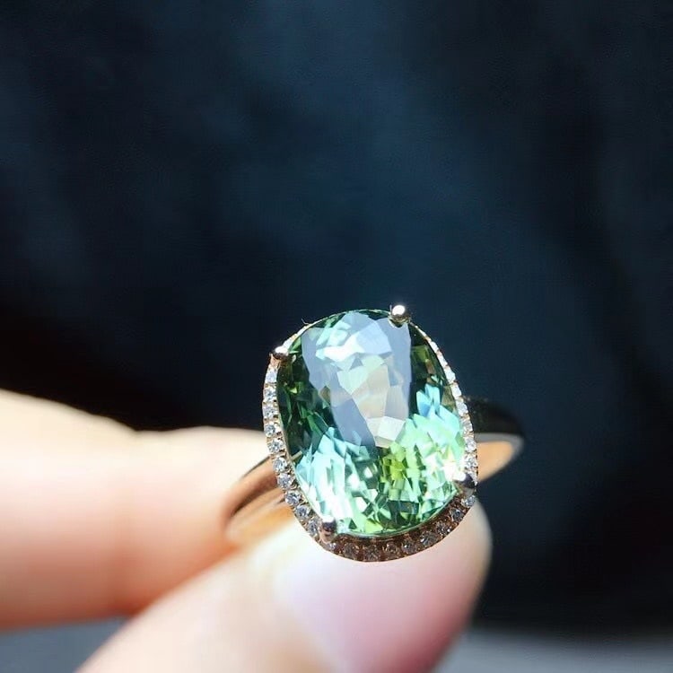 14k Gold 5.55 Ct Natural Tourmaline & Diamond Ring: Ref:231146207 // gold content:14k gold // ring size:7. 25us // // main gemstone:tourmaline // shape:oval // carat weight:5. 55ct // color:green // treatment:natural // // adjacent gemstone 2 : diamond