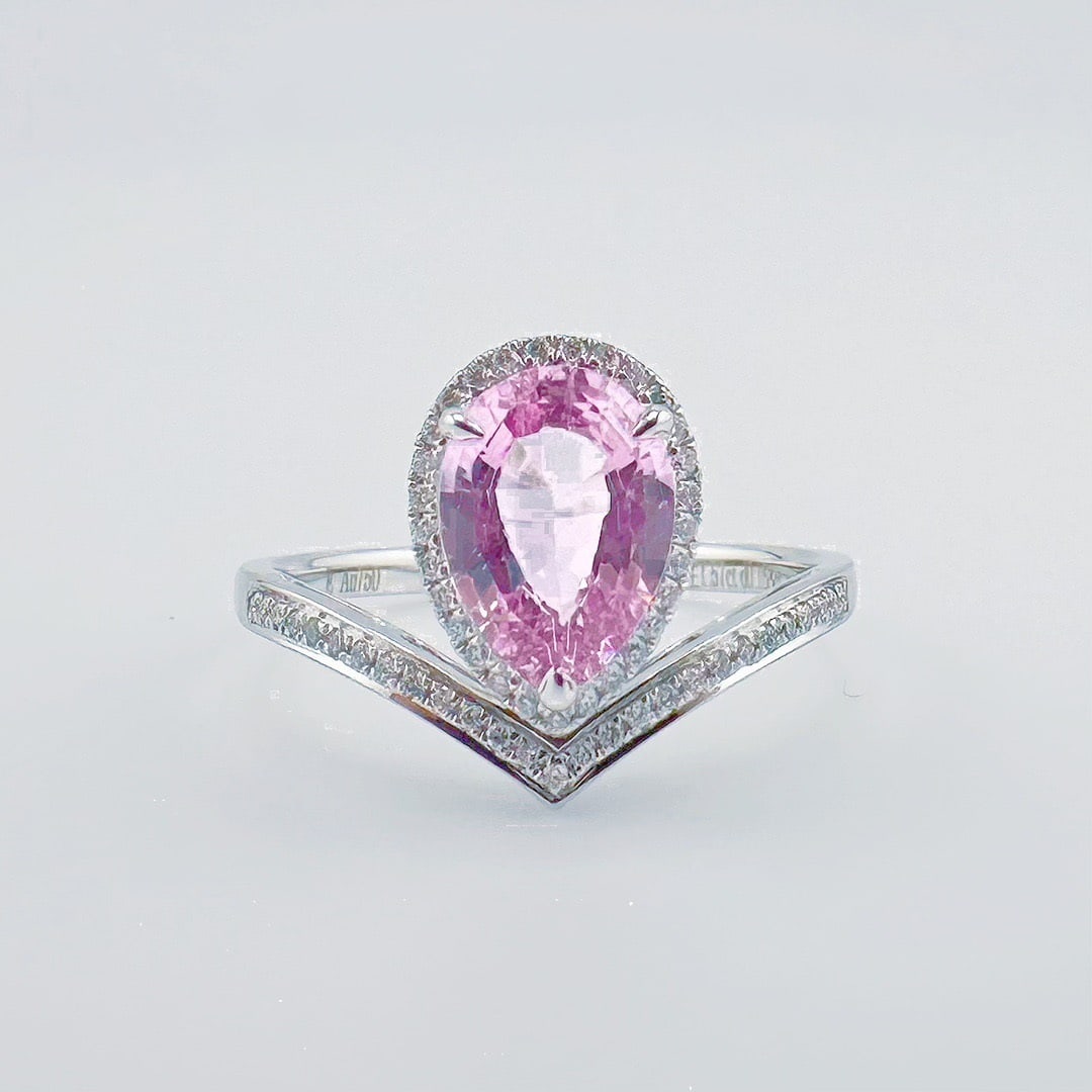 14k Gold 1.74 Ctw Natural Sapphire & Diamond Ring: Ref:231146008 // gold content:14k gold // ring size:7. 25us // // main gemstone:sapphire // shape:pear // carat weight:1. 57ct // color:pink // treatment:natural // // adjacent gemstone 2 : diamond